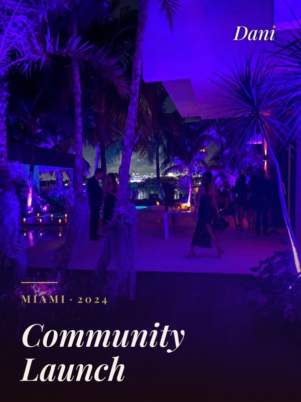 Community Launch, Miami 2024: a palm garden lit purple at night, guests drifting past the pool over Biscayne Bay