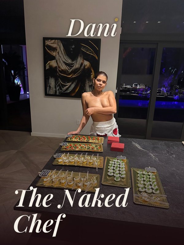 The Naked Chef: a server behind trays of canapés